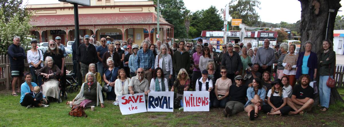 The crowd gathers opposite the Royal Willows Hotel, Pambula to demonstrate against the demolition of the old building. Photo: Denise Dion
