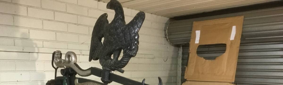 This cast iron eagle is part of a historic working printing press and was stolen from a Wolumla shed in December 2022. Picture supplied