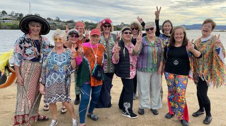 Some of the hippies giving it peace and love on the beach at Mallacoota.