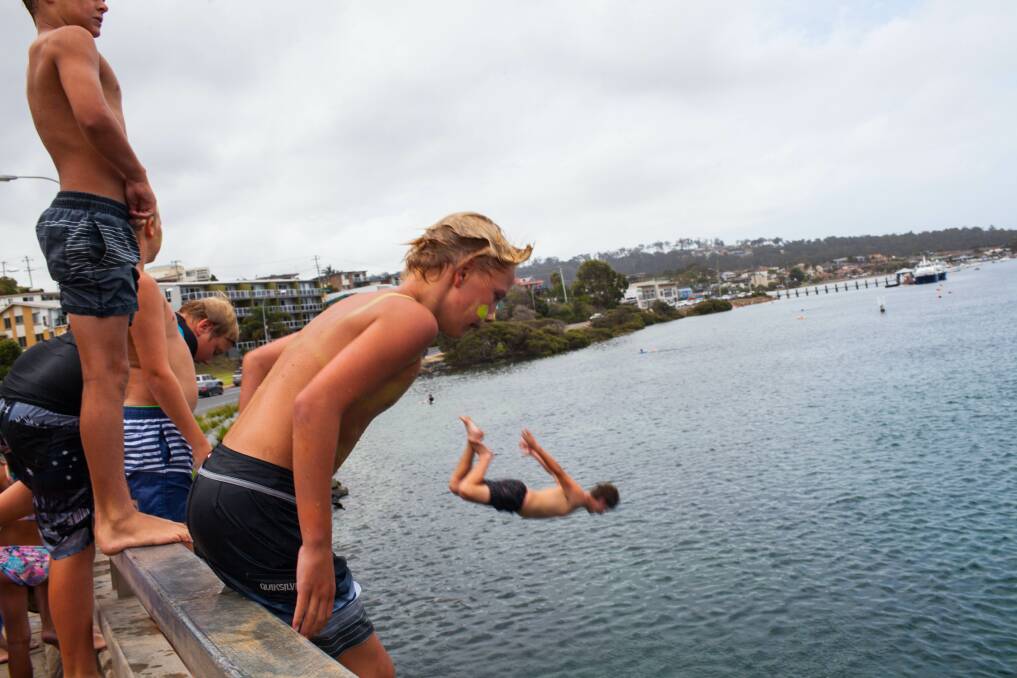 Jumping off the Merimbula Bridge on Australia Day. Photo: Rachel Mounsey