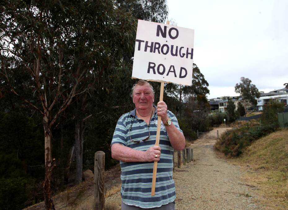 "Once it's open it will be a problem": Camilla Crt resident Robert Stephens is concerned unlocking the road will bring unwanted traffic through the quiet court. Photo: Rachel Mounsey