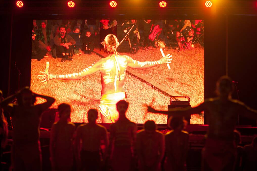 WELCOME TO COUNTRY: Gulaga Dancers perform in front of a crowded audience at the Giiyong festival. Picture: Rachel Mounsey