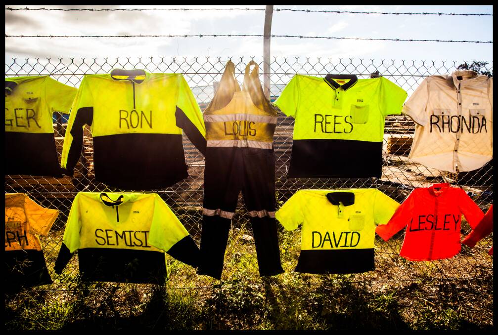  Timber workers protest. Blue Ridge Hardwoods' employee's work shirts hang along the mill's fence line along the Princes Highway Eden. Photo: Rachel Mounsey