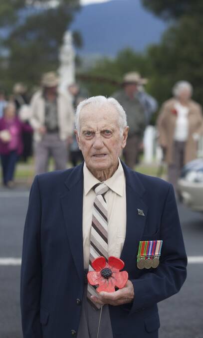 AIRCRAFTMAN: Bill Allen was presented with a ceramic poppy at the 2015 Bemboka Anzac Day ceremony as he was the last WW2 veteran in the town. Photo: Peter Smith