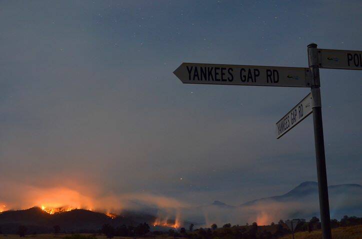 The fire that started off Yankees Gap Rd continues to burn on the night of September 17. Picture: Rachel Helmreich
