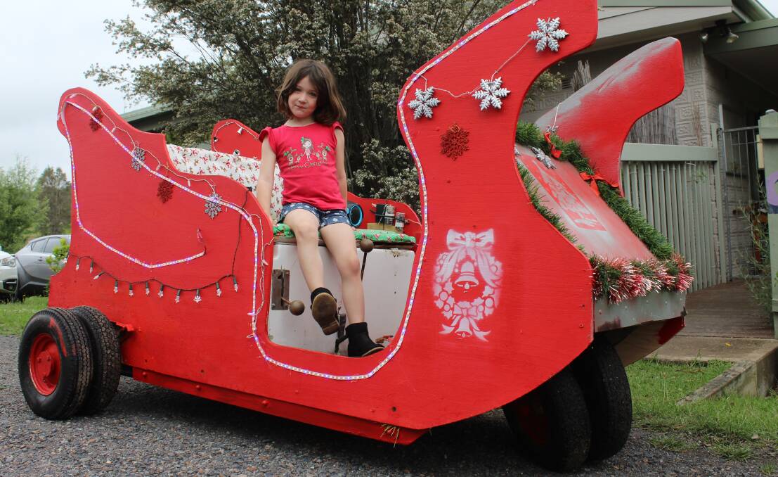 Kennedy Kelly of Cobargo sees what it's like to sit behind the wheel of Dave Rydgendyke's sleigh. 