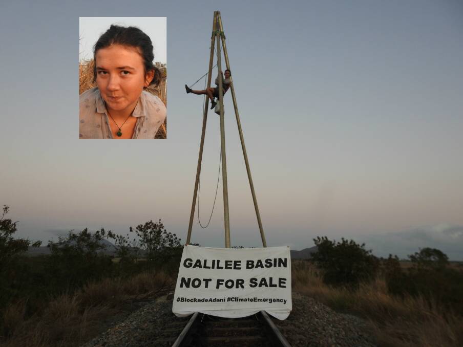 CALL FOR ACTION: A rail line to the Adani-owned Abbot Point Coal Port is blocked by a tripod holding Hannah Doole (also pictured in the insert) on November 11, 2018. Pictures: Supplied
