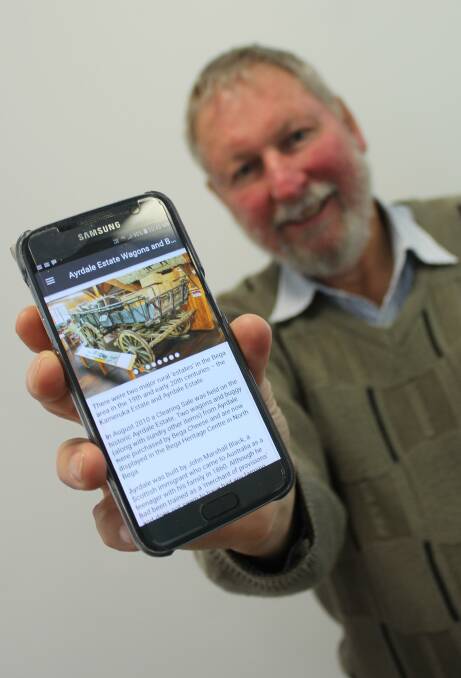 HISTORY REVEALED: South Coast History Society president Peter Lacey shows the new Hidden Heritage app on his phone. 