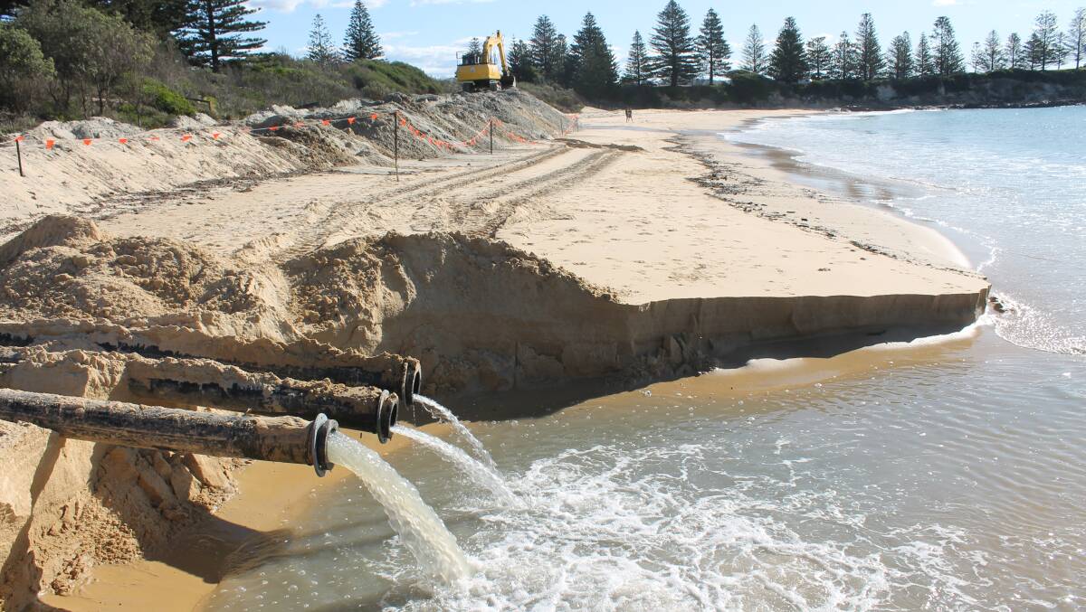 The dredging operation at Horseshoe Bay Beach. 