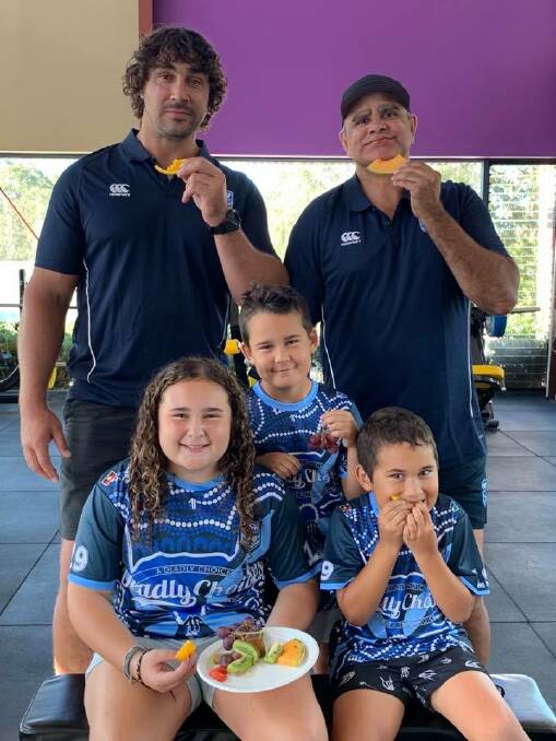Daniel, Mariah and DJ with NRL players Tom Learoyd-Lahrs and Nathan Blacklock
at the launch in Batemans Bay. 