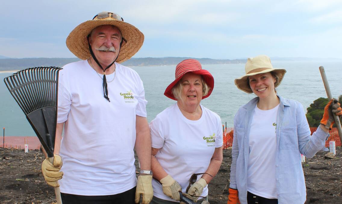 Tathra's Keith and Debby Pitchford joined Merika Nordquist to help with the planting. 