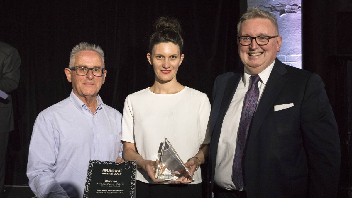 GREAT ACHIEVEMENT: M&G NSW chair Ray Christison and Minister for Arts Don Harwin present the award to Bega Valley Regional Gallery's Jasmin Brown. 