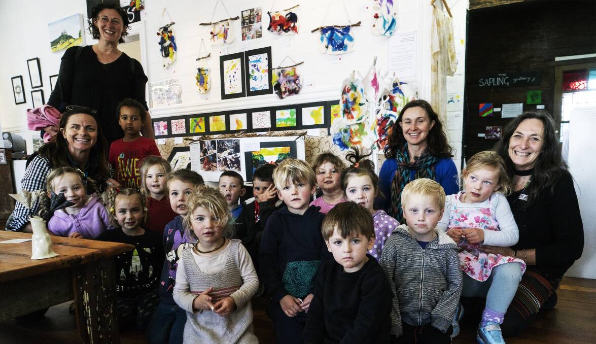 YOUNG ARTISTS: Shelley Boyle, Megan Ringrose, Sonia Evans and Christine McKnight visit the exhibition with the children of Cobargo Preschool. Picture: Nicholas Walton-Healey
