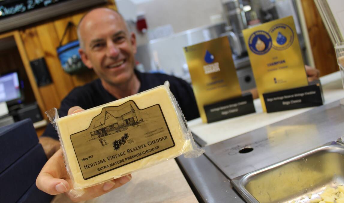 WINNING PRODUCT: Cheese quality supervisor at Bega Cheese Philip Tatzenko holds a packet of the award-winning Heritage Vintage Reserve Cheddar. 