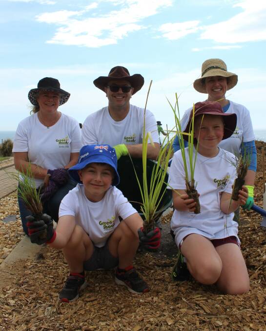 REGROWTH: Angela Robbers, Byron, David and Kirby Schmidt and Sharon James are all Tathra residents who came to the headland to help with the planting. 