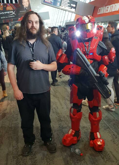 DIGITAL WORLD: William Sharples meets one of the characters at the recent International Games Week in Melbourne. 