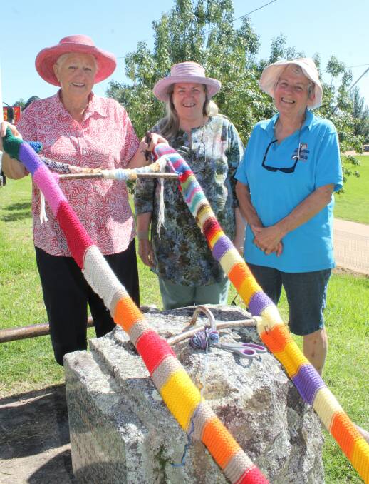 CREATIVE: "Yarn bombers" Marie Smith, Jeanne Gauld and Val Little.