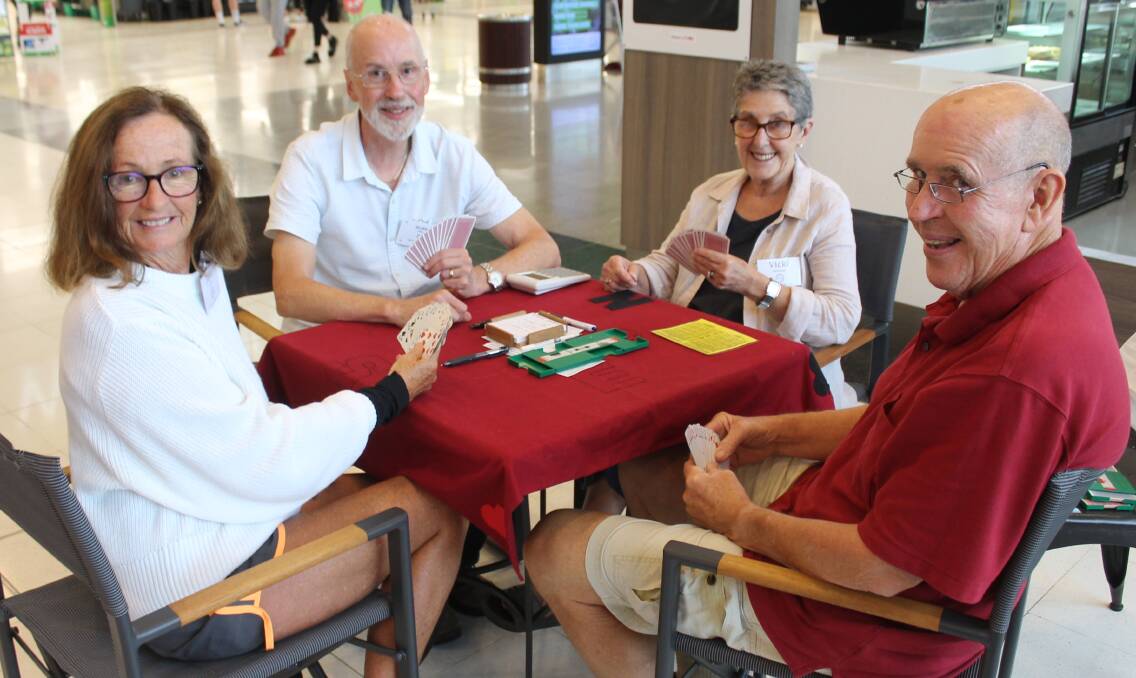 SOCIAL GAME: Enjoying a game of bridge in Bega on Thursday are Julie Colwell, Mark Oakley, Vicki Kennaugh and Rob Rovilliard. 
