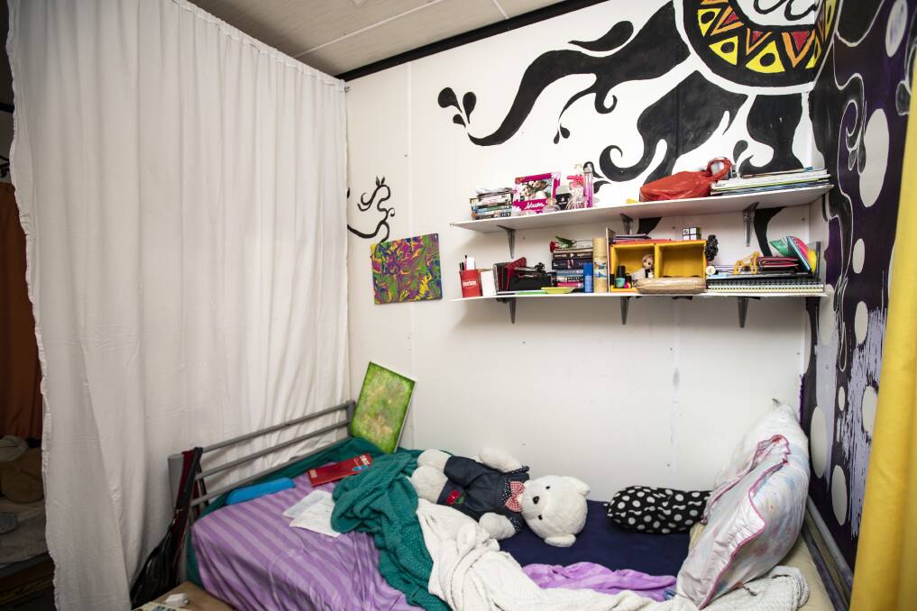 This September 4, 2018, photo shows the bedroom of a teenage refugee in the Nibok refugee settlement. The refugee spends all her time here, and has installed a sheet to provide some privacy in a tiny space from her sister. About 120 refugee children and teenagers are living on Nauru. Picture: Jason Oxenham/Pool Photo via AP