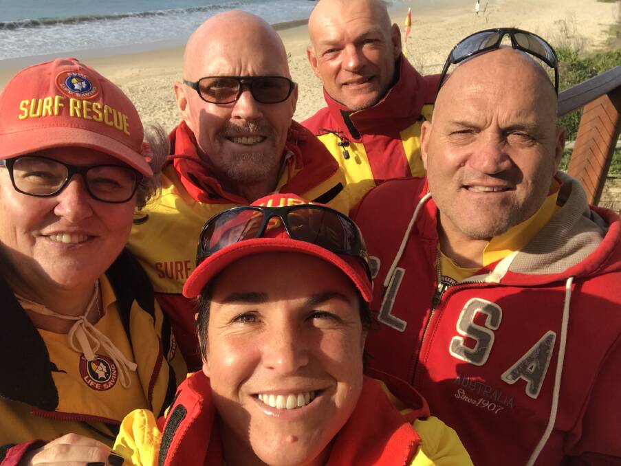 Bermagui Surf Life Saving Club members Sue Hunt, Bruce McAslan, Cheryl McCarthy, Andrew Curven and visiting patroller from Batemans Bay SLSC Tony Vella check out the beach. 