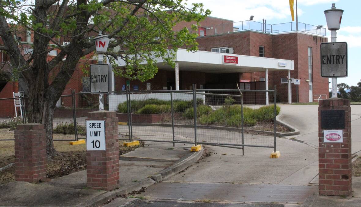 NO ENTRY: Fencing is installed around the old Bega District Hospital on September 30. 