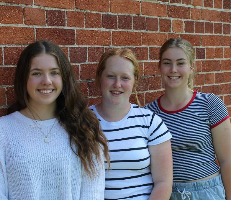 FIRST ONE DOWN: Riley Murdoch and Teya Dalziel of Tathra as well as Carrie Evans of Cobargo were happy to finish their English exams for the HSC on Thursday. 