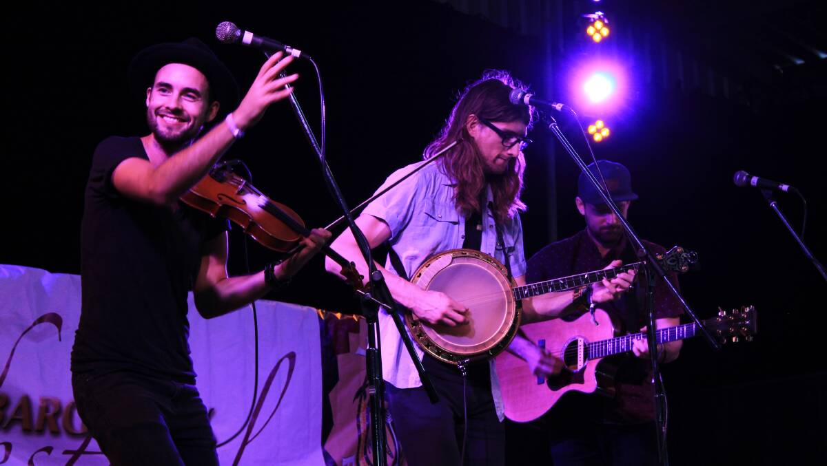 WHEN WILL FESTIVALS RUN AGAIN?: The East Pointers perform at the 2016 Cobargo Folk Festival. 