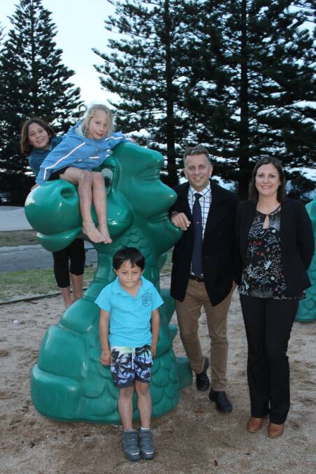 EXCITED FOR A NEW PLAYGROUND: Andrew Constance and Kristy McBain say hello to children who were playing at Tathra's current playground, Mahli Bajaro of Doctor George Mountain, Sunny Risby of Kalaru and Kai Bajaro of Doctor George Mountain. 