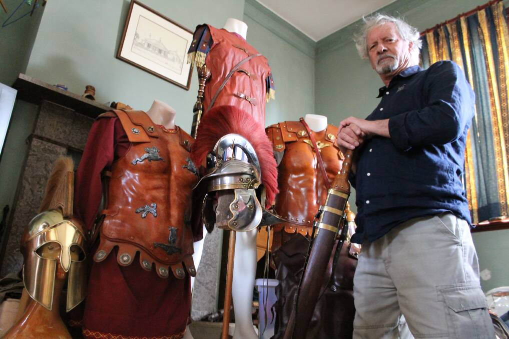 ANCIENT ARMOUR: Milton Wicks displays some pieces from his collection of Roman and Greek soldier costumes, some of which he has made himself. 