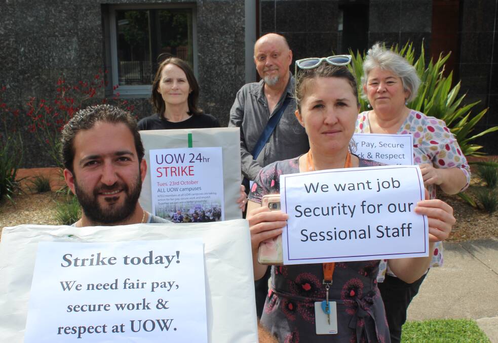 STRIKE: Protesting outside Bega's UOW campus on Tuesday are Mohammad Attar, Siobhan Wragg, Jamie Shaw, Jodie Stewart and Helen Pratt. 