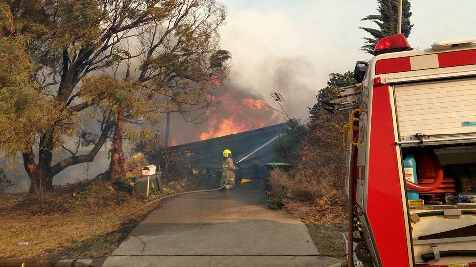 Moruya Fire and Rescue assists in the Tathra bushfire emergency on Sunday, March 18. Photo: Moruya Fire and Rescue.