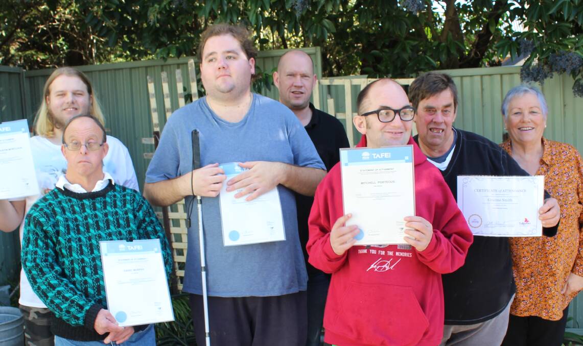 HIGH ACHIEVERS: Tulgeen's supported employees who received an attainment of food safety are Jonathon Mortlock, David Murphy, Zac Cheney, Mitchell Porteous and Graeme Smith with Dave Akehurst (centre) and Jen Russell. 