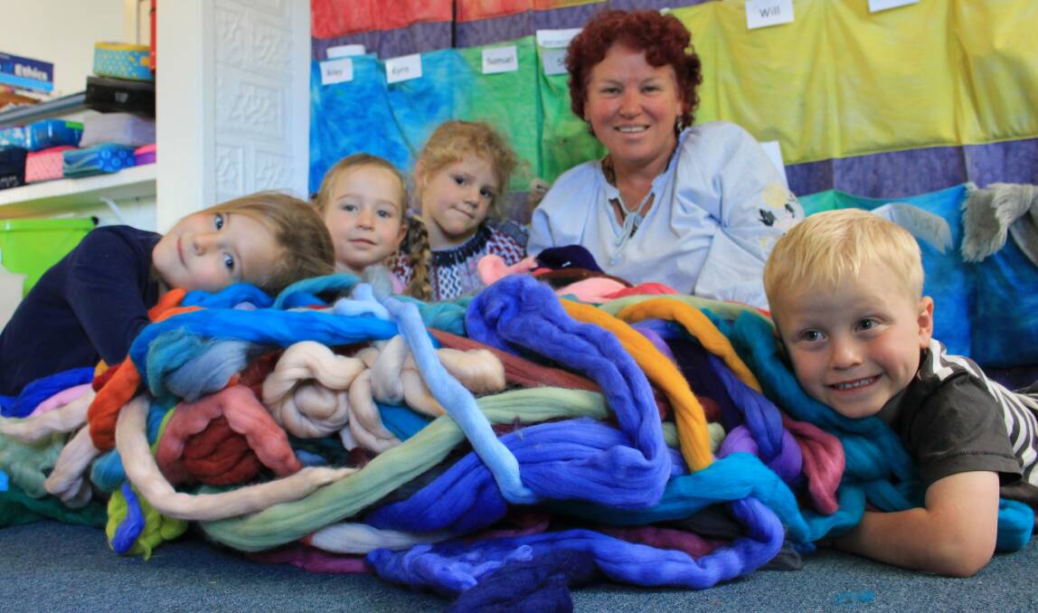 HAPPY KIDS: Jodie James teaches felting to Cobargo Preschool children Stevie Gannon, Ocean Lyle, Essie Pilkington and Harry Grebert. 