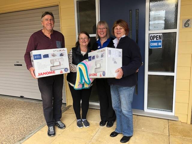 GENEROUS: Paul and Fran Sorensen from Vinnies deliver sewing machines to Caralyn Naylor from Bega Valley Shire Council with Danni Koenigkamp from Vinnies. 