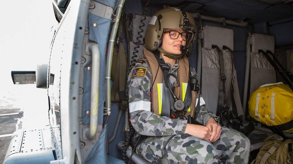 Leading Seaman Combat Systems Operator Tina Dummett onboard an MH-60R Seahawk 'Romeo' during Operation Bushfire Assist 19-20. Picture: ABIS Thomas Sawtell