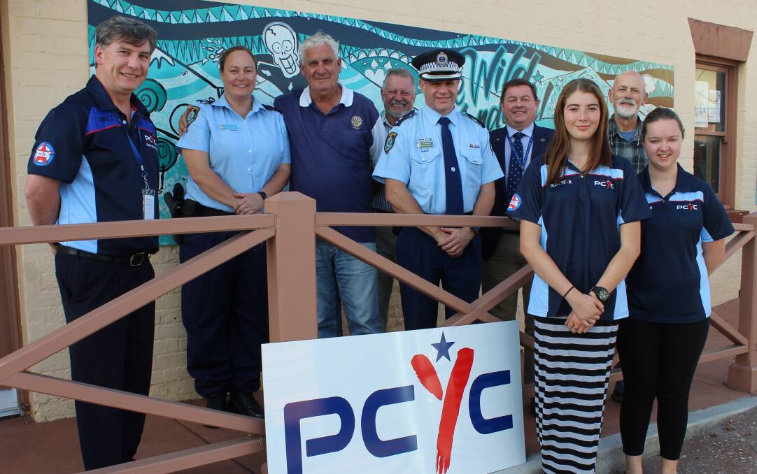 LOOKING FOR A NEW HOME?: Far South Coast PCYC's Jason Hough and youth case manager for the Bega Valley Sarah Bancroft with members of the Pambula and Merimbula Rotary Clubs, Superintendent David Roptell, PCYC CEO Dominic Teakle and Blue Star Program participants Kayla Odell and Chloe Peck in Bega on Thursday. 