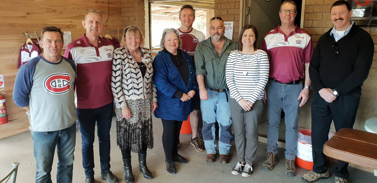 UPGRADES: On Saturday, dignitaries celebrate the progress of work at Tathra Sea Eagles AFL Club's Lawrence Park facilities, including installation of a 12kW solar system. 