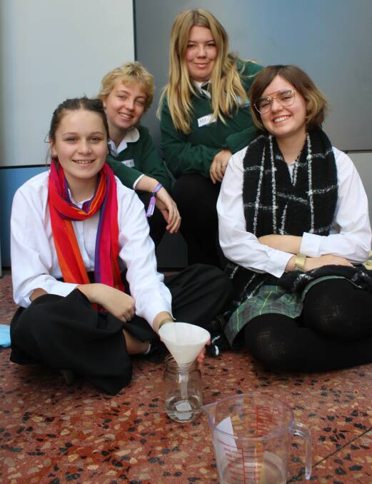 Hannah Welsford, India Hartley, Maya Armstrong and Ella Kunzli-Doig of Year 10 at the Sapphire Coast Anglican College learn about water filtration at the Power of Engineering in Bega. 
