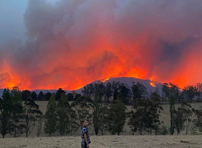 Jilian Hayes captured this incredible image from her family farm at Bemboka with the Werri Berri fire closing in over the hills earlier this year. 