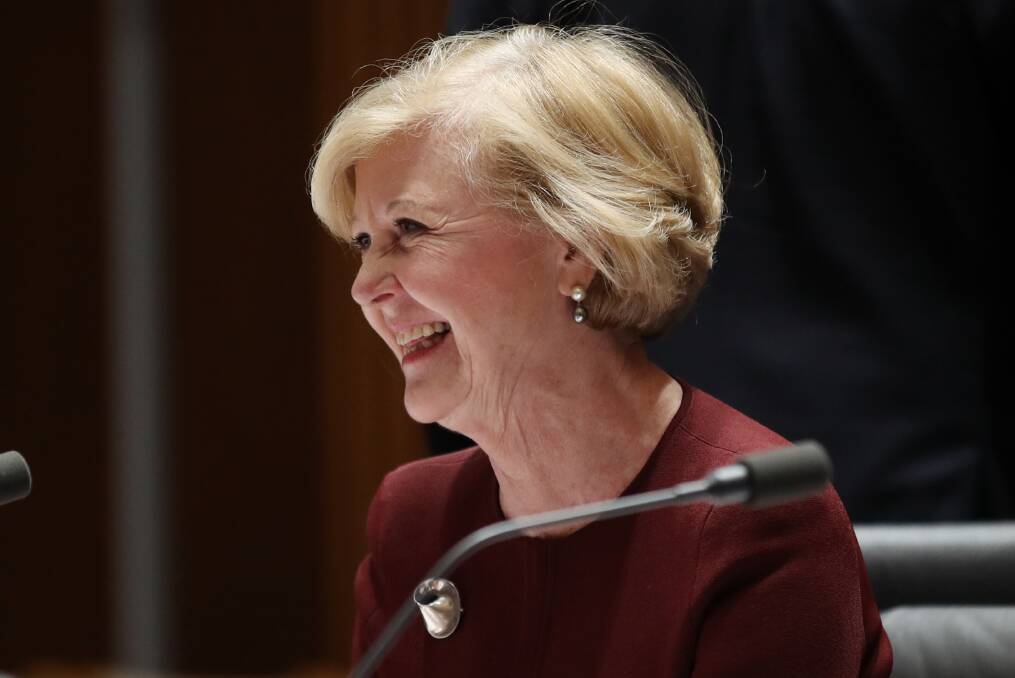Gillian Triggs, the then-president of the Human Rights Commission, is thanked by Senator Nick McKim and Senator Penny Wong at Parliament House, Canberra in 2017. Photo: Andrew Meares