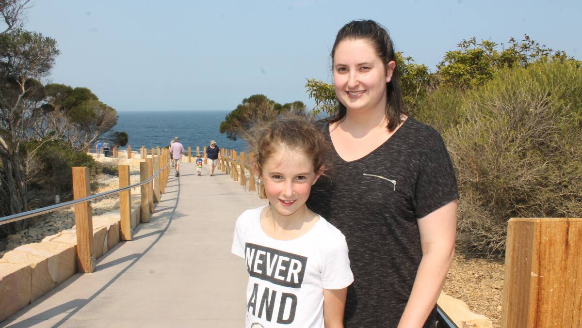 SPECIAL PATH: Laura Egerton and her daughter India Matheson of Tathra take a stroll on the new Tathra Headland Walkway on its opening day. 