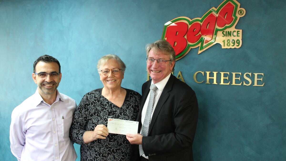 GENEROUS DONATION: Bega Cheese executive chairman Barry Irvin (right) presents Tulgeen CEO Jen Russell and board director John Stylianou with a cheque for $100,000. The donation will assist supported accommodation.