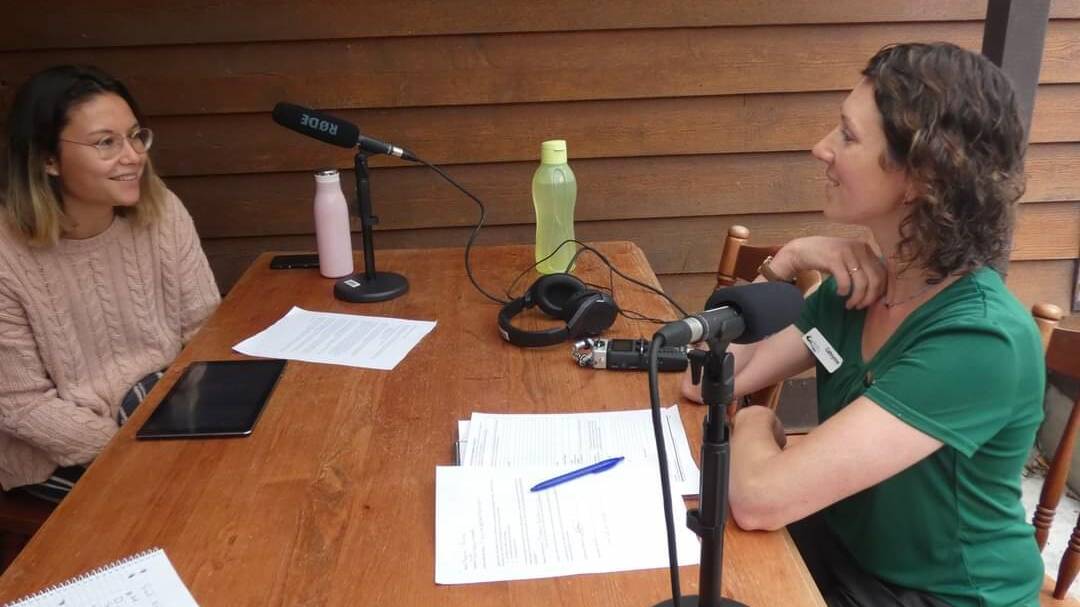 Library officer Cat McLean interviews Wonboyn visitor Naomi Furrer for the bushfire oral history project. Picture: Supplied 