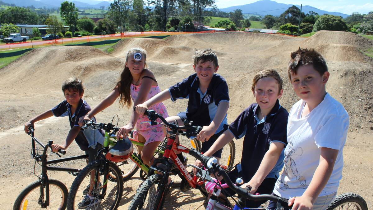 KEEN RIDERS: Cobargo children ready to ride on the new track are Fletcher and Hazel Robinson, Nate Miller, Jack Grebert and Henry Blackford. 