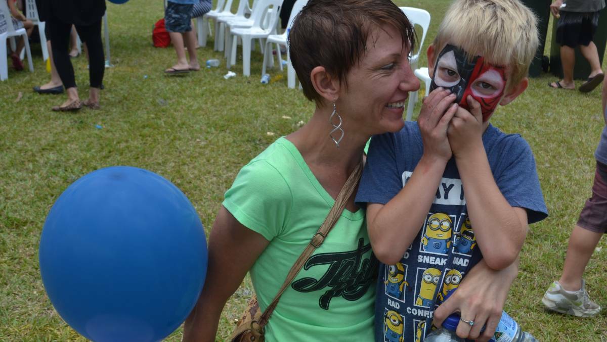 FAMILY TIME: Kelly and Kayne Bruce enjoy a previous Christmas celebration at Parramatta Park in Nowra.