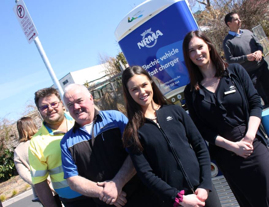 The NRMA's Bowen and Martin Finnerty stand in front of the new fast-charging station with NRMA Bega's Natasha Troy and Maddison Richardson. 