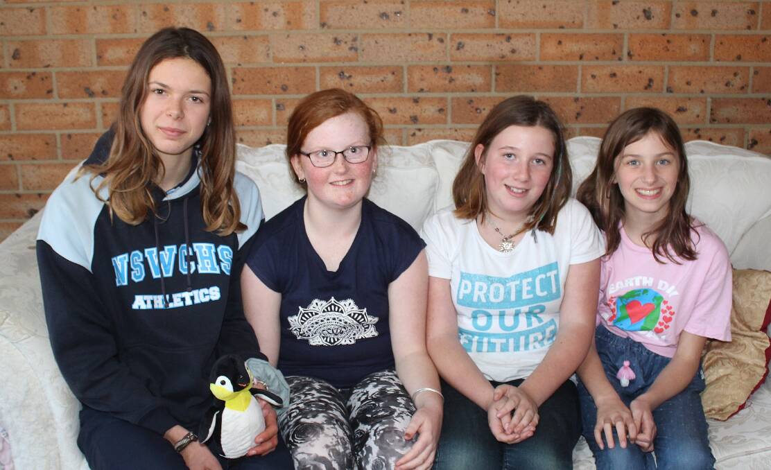 FIGHTING FOR THE PLANET: Minka Waratah, Amalia-Grace Thompson, Jada Koeck and Alina North-Andrew help organise the Schools Strike for Climate rallies in Bega. 