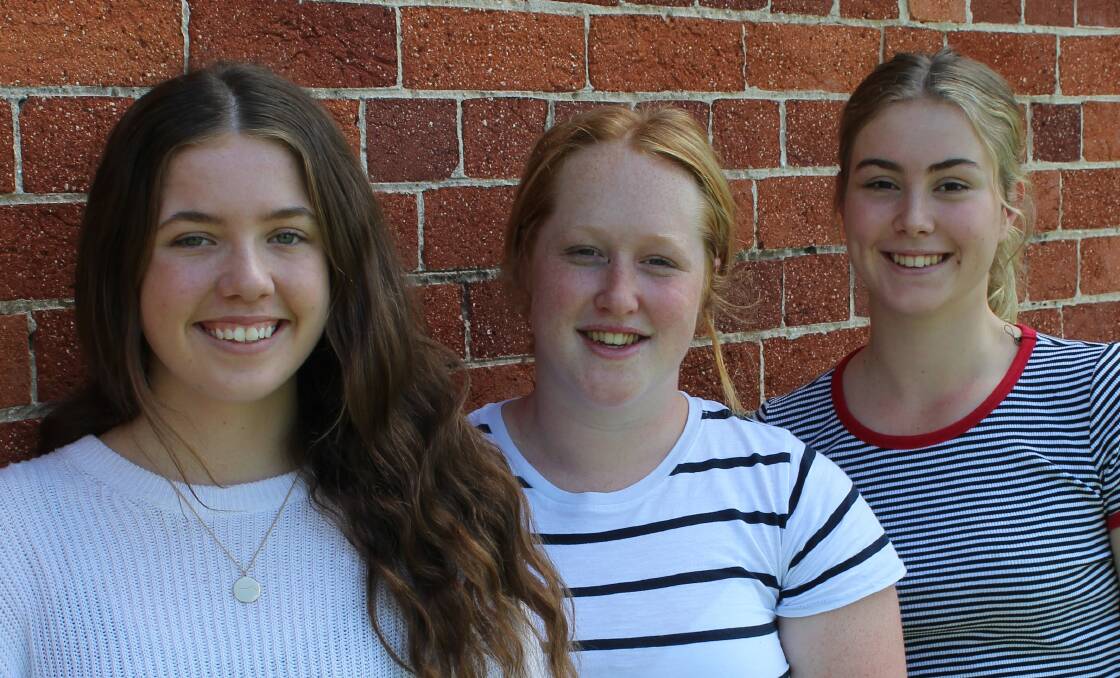 HIGH ACHIEVERS: Riley Murdoch (left), Teya Dalziel of Tathra and Carrie Evans of Cobargo finish their English exams for the HSC in October. 