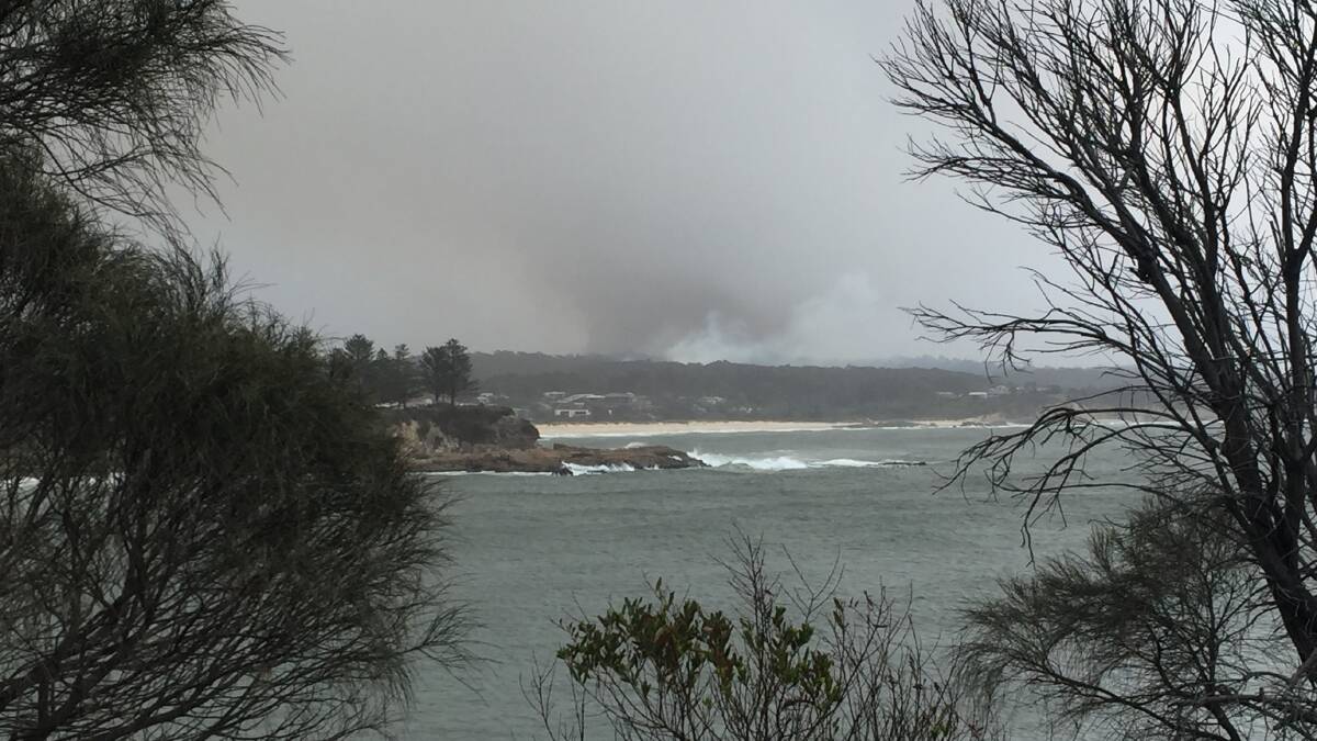 The Badja Forest Road Fire flares up on January 23 north of Bermagui, at Dignams Creek and Coolagolite. This picture was taken from Dickinson Point, Bermagui. 