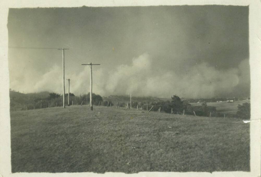 PIECE OF THE PAST: Rita Roberts has shared this photo belonging to her husband Richard, taken during the 1952 bushfires from outside Bega. 